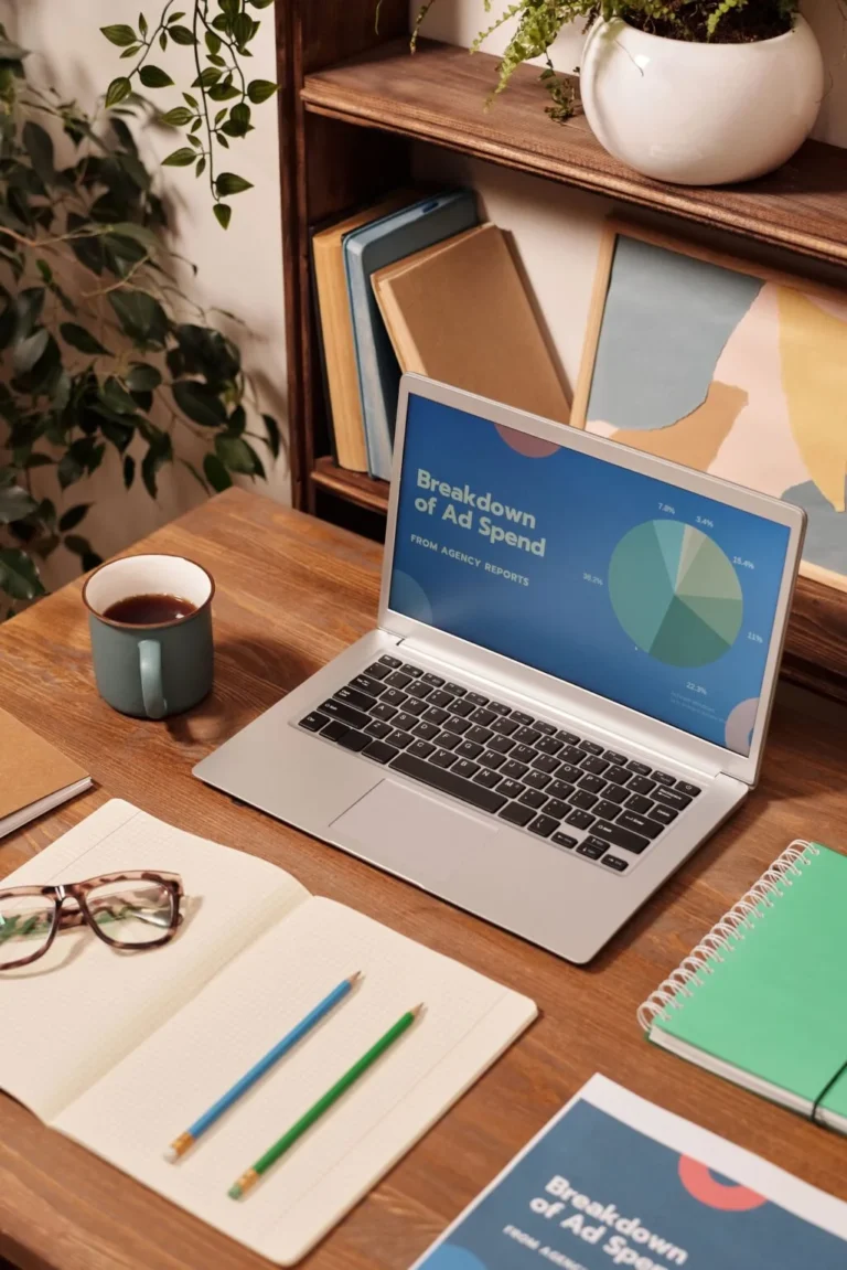 Best Freelance Digital Marketer in Dubai.Digital marketing workspace with laptop showing advertising analytics and campaign performance dashboard, ideal for content about digital marketing, online advertising, PPC campaigns, marketing analytics, and business growth
